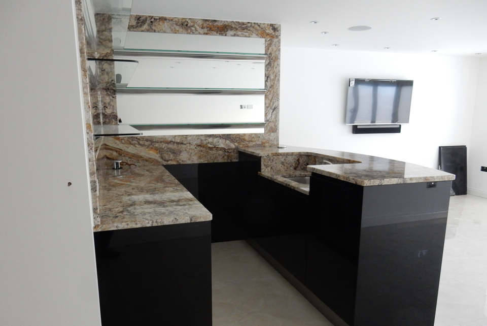 Betularie Granite (cabinetry by Jota Kitchens)