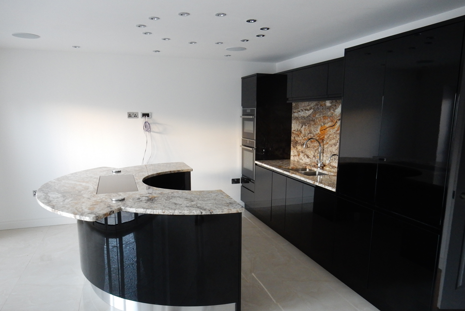 Betularie Granite (cabinetry by Jota Kitchens)