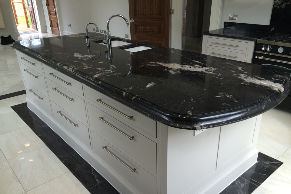 Titanium Granite (cabinetry by Kandu Interiors)