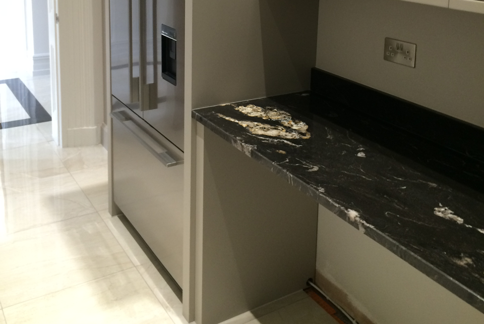 Titanium Granite (cabinetry by Kandu Interiors)