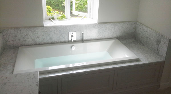 Bianco Carrara Marble (cabinetry by Rose County Interiors)