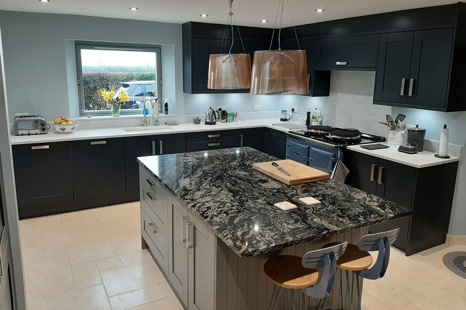 AG Quartz Fusion White & Indian Black Sensa Granite (cabinetry by Trademark Kitchens & Bathrooms)