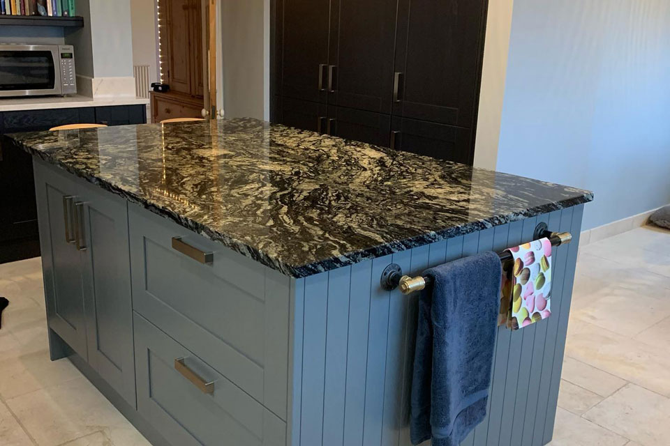 AG Quartz Fusion White & Indian Black Sensa Granite (cabinetry by Trademark Kitchens & Bathrooms)